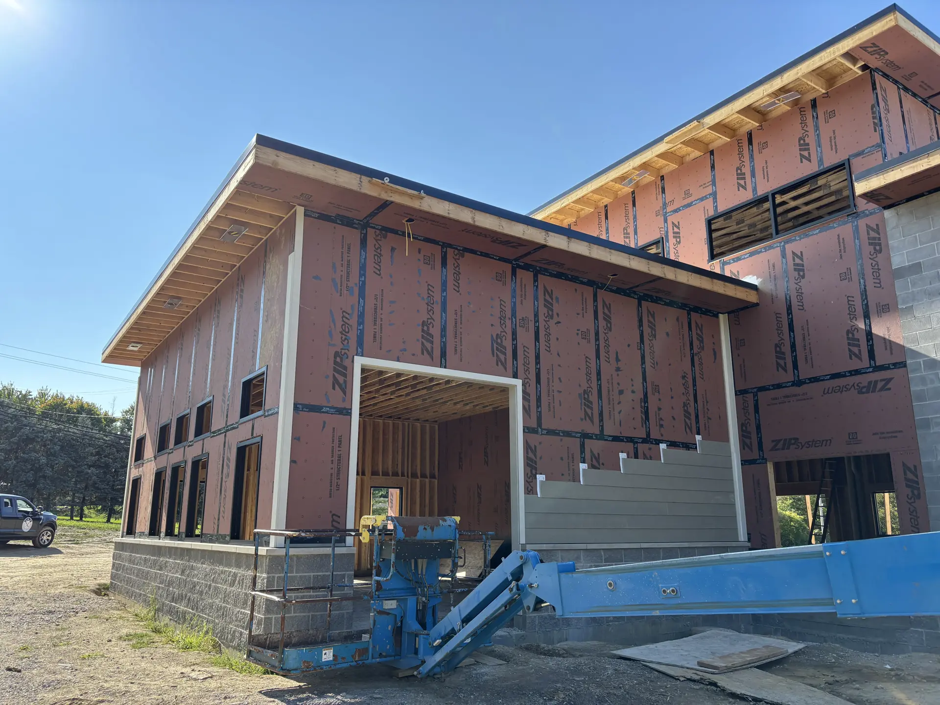 Siding installation beginning with lift